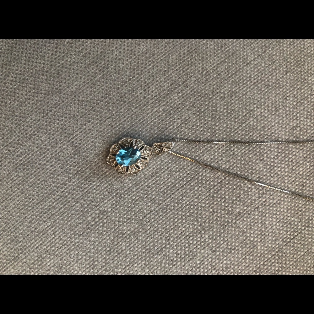Aquamarine and diamond pendant